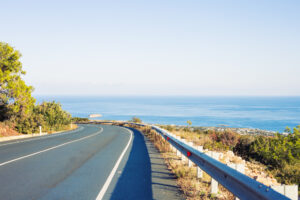 road with ocean to right